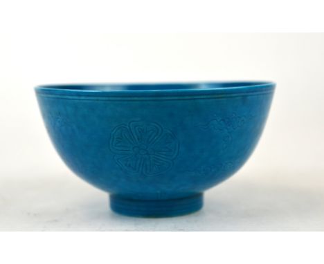 Chinese Blue Glazed Incised Porcelain Bowl 20th Century. Chinese porcelain bowl, covered in a  blue glaze and incised with fl