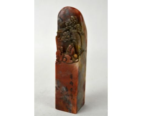 Chinese Carved Soapstone Seal Chinese chicken blood soapstone with a man resting  under a tree. 5 3/4" x 1 1/4"