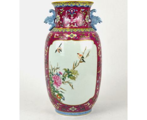 Early 20th Cen. Chinese Famille Rose Vase Chinese porcelain Famille Rose vase painted with  panels of flowers surrounded by f