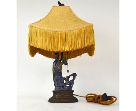 19th C. Chinese Carved Lapis Figural Lamp Chinese carved lapis figural lamp base under a  fringed shade, topped with carved l