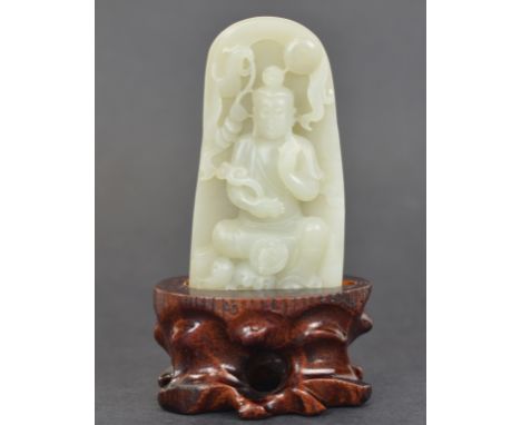 Chinese Carved Jade Buddha Figure On Wood Stand Chinese white jade plaque carved with buddha, on a  carved wood stand. Jade: 