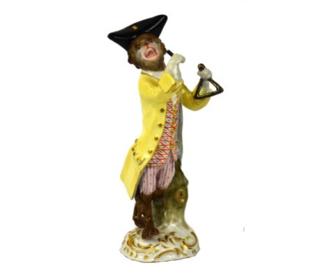 Meissen Porcelain Monkey Musician Meissen porcelain figure of a well-dressed monkey  playing the triangle. Very minor touch-u
