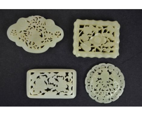 Four Chinese Open Work Carving Of Jade Plaques Chinese carved jade plaque with open work of two  boys and floral design. 2 1/