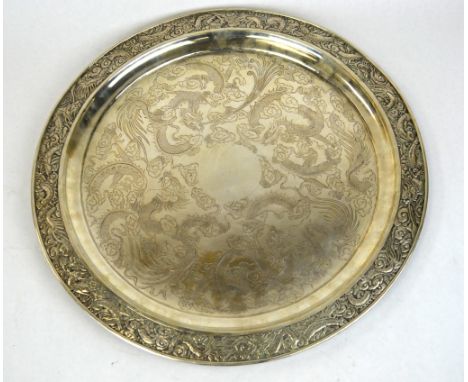 Large Chinese Engraved Silver Tray Large Chinese silver round tray etched with dragon  design within a border of dragons. Imp