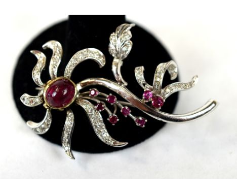 14K White Gold, Ruby & Diamond Pin 14K White gold floriform pin inlaid with one large  ruby (7mm x8mm) and seven smaller rubi