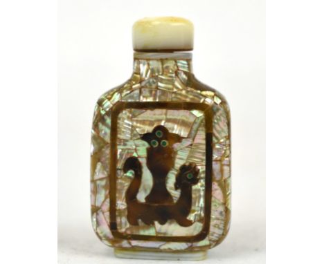 Chinese Mother of Pearl Snuff Bottle Chinese snuff bottle of mother of pearl decorated  with an animal. 2 1/2" x 1 1/4" x 1/2