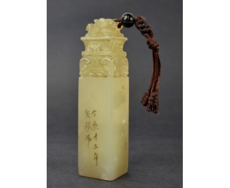 Chinese Carved Soapstone Seal Chinese carved white soapstone seal chop with  animals. 5" x 1 1/4"