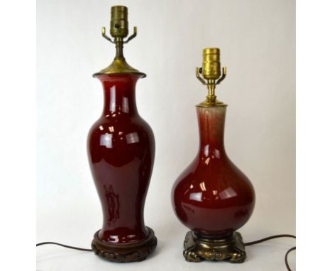 Two Chinese Red Glazed Porcelain Vases Lamps Two Chinese vases covered in oxblood glaze,  converted into lamp bases, one on m