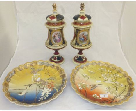A matched pair of circa 1900 Meiji Period Japanese Satsuma ware chargers of scalloped form, the centre fields decorated with 
