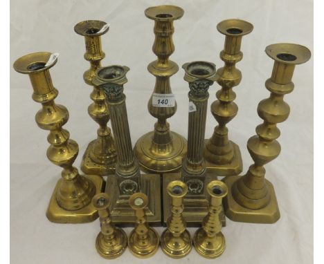 Three pairs of brass candlesticks various, a single candlestick, and two pairs of miniature brass candlesticks