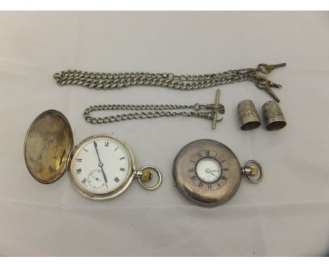 A George V silver cased half hunter pocket watch, the white enamel dial set with Roman numerals inscribed "J. W. Benson Londo