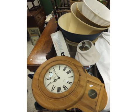 A box containing a William Drew battery operated pine framed wall clock with Roman numerals, a Ronson British Patent 29165 Qu