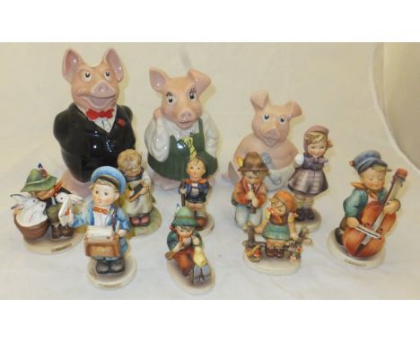 A collection of nine Goebel Hummel figures to include "Busy Student", "Little Tooter", "Sweet Music", "Playmates", "Boy with 