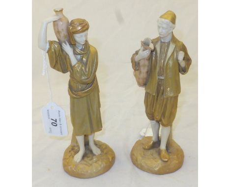 A pair of Royal Worcester blushware figures "Water carriers", No'd. 1206 in puce to base CONDITION REPORTS Approx 20.5 cm hig