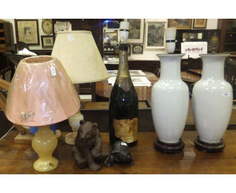 A pair of white baluster shaped table lamp bases, a lamp base formed from a Krug 1953 champagne bottle, two onyx type table l