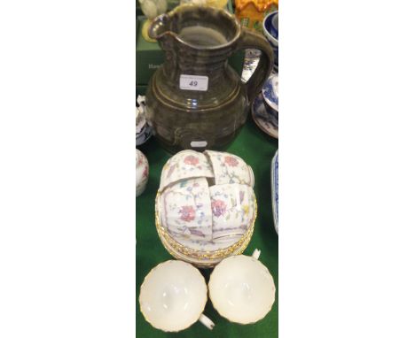 A Royal Worcester "Kashmir" pattern set of six cups, saucers and plates, together with a large Winchcombe pottery jug