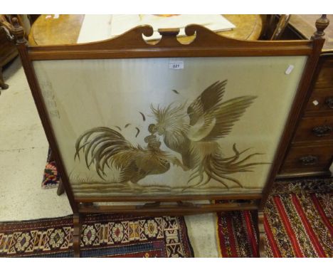 A mahogany and stained beech rectangular firescreen with silkwork central panel depicting cock fighting 