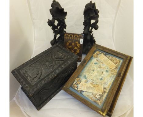 A pair of 19th Century carved walnut embellishments as foliage and fruit, a Tunbridgeware and marquetry inlaid travelling dre