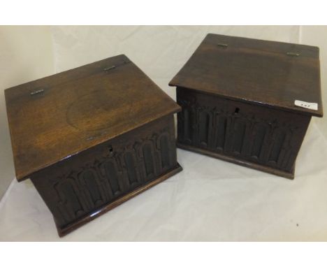 Two 19th Century oak lidded boxes with lunette carved panel fronts