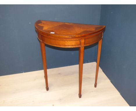 Good Edwardian Sheraton revival half moon card table, crossbanded with segmented top, green baize interior 