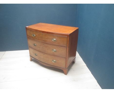 Regency mahogany bow front chest of three cockbeaded drawers 100cm wide