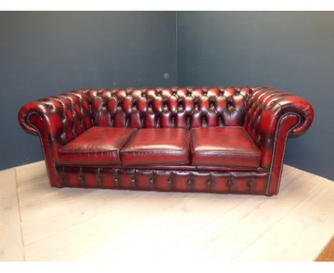 Modern red leatherette 3 seater button back Chesterfield
