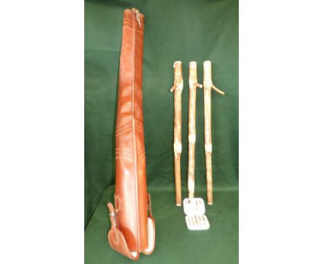 Double fleece lined leather gun slip and Wheatley fly tin with flies and walking stick