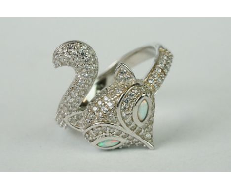 Silver and CZ cat style dress ring, set with opal panels 