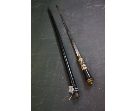 A 20th century sword stick with bone decorative band. 