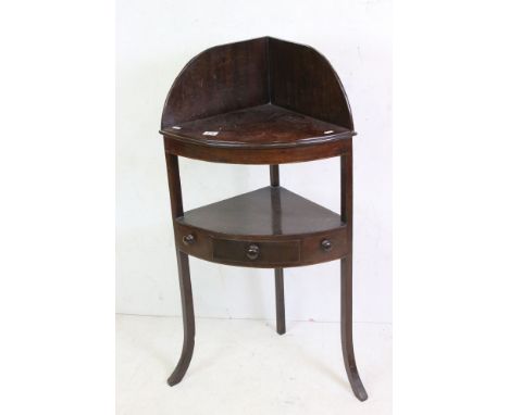 George III Mahogany Bow Fronted Corner Washstand, the shelf below with one drawer and two faux drawers, 103cm high x 56cm wid