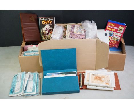 A collection of stamps to include first day covers and mint examples contained within two boxes. 