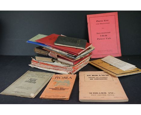 A box of mixed ephemera to include Fordson Tractor parts books, photographs and vintage map. 