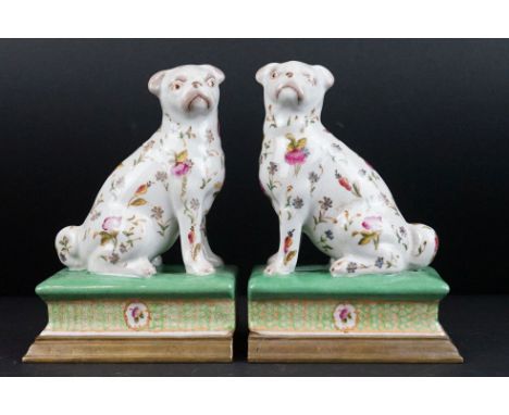 Pair of Contemporary Ceramic Bookends in the form of Pug Dogs on Plinth Bases, 19cm high 