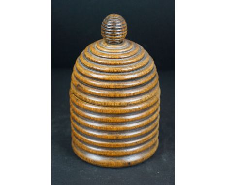 Late 19th / Early 20th century Treen Ring Carved Lidded Box of Beehive form, 17cm high 