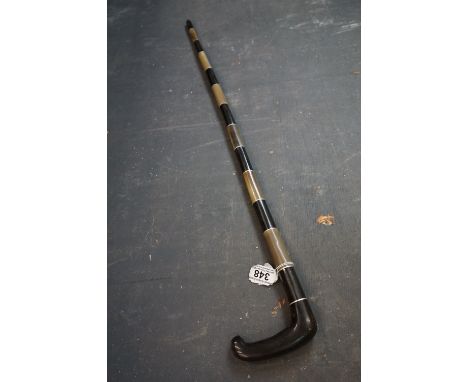 An early 20th century horn banded walking stick. 