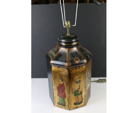 A contemporary lamp base in the form of an antique tea caddy with figural decoration. 