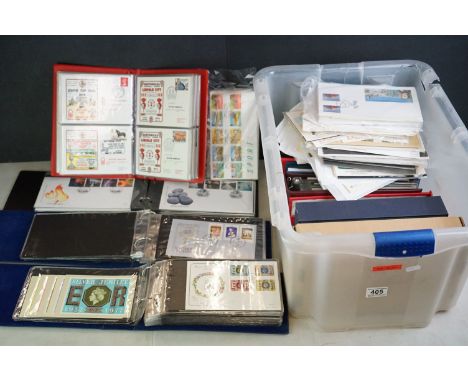 Stamps - a large collection of mainly Royal Mail first day covers, in albums and loose, to include football related examples 