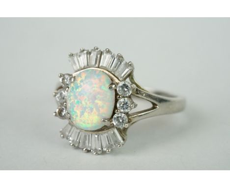 A 925 sterling silver and opal dress ring. 