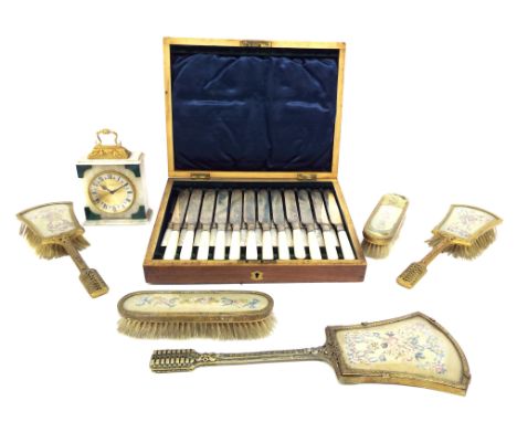 Boxed set of twelve knives and forks with mother of pearl handles; together with an Elsinore mantel clock and a five piece dr