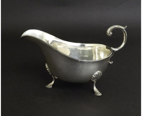 Georgian style silver sauce boat, with plain decoration and hoof pad feet, maker William Hutton & Sons Limited, Sheffield 192