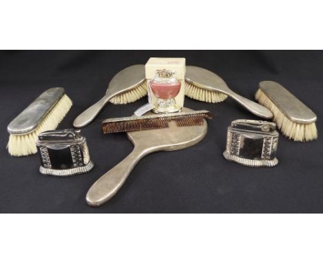 Engine turned silver six piece dressing table set of four brushes, hand mirror and comb (faults); maker William Comyns and So