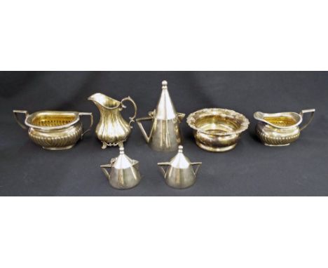 Small selection of silver plate items to include a wine coaster with wooden base decorated with grapes, a baluster jug, match