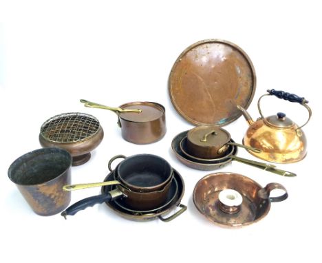Small quantity of brass and copper, including milk pans, saucepans with lids, twin handled dishes etc, also a copper teapot