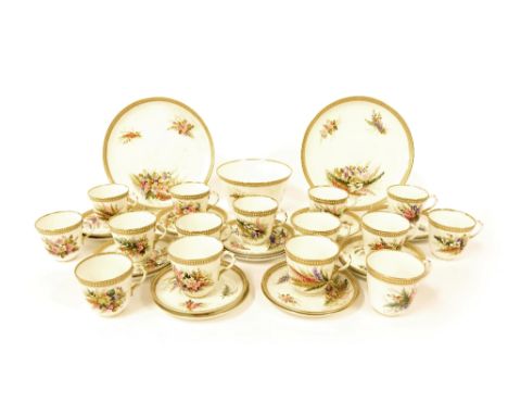 Royal Worcester porcelain tea service, finely painted with floral sprays within gilt and raised bead borders, pattern 8292, c