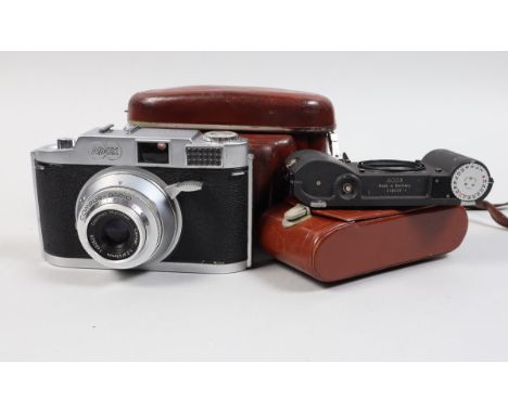 An Adox 300 35mm Camera, shutter lever cocks, shutter button works, shutter not opening, meter responsive, body G, with 45mm 