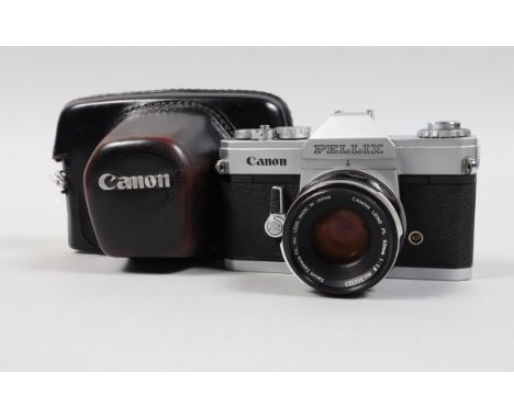 A Canon Pellix SLR Camera, shutter working, self timer working, meter untested, body G, some debris in viewfinder, with 50mm 