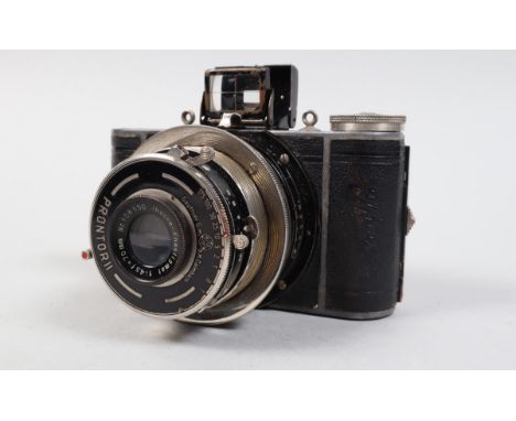 An Ihagee Parvola Camera,  serial no 511161, shutter working, body G, some brassing, with 70mm f/4.5 Anastigmat lens, element