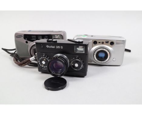 Three Compact Cameras, a Rollei 35 S, made in Singapore, shutter working, body G, elements G, in case, with cap, a Rollei Gir