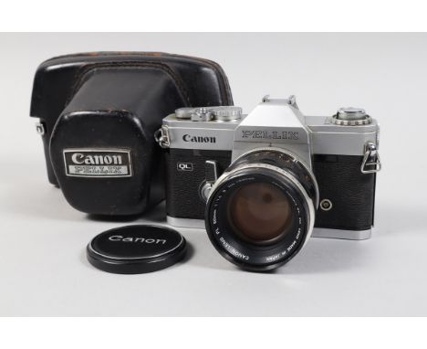 A Canon Pellix QL SLR Camera, shutter working, self timer stutters, working, with 50mm f/1.4 II FL lens, barrel G, elements G