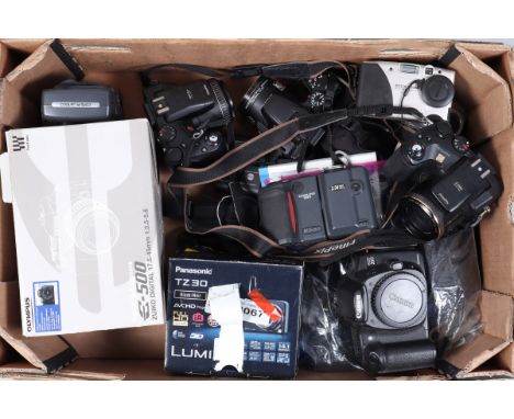 A Tray of Digital Cameras,  including an Olympus E-500, with manual, maker's box, no battery, charger present, untested, A Ca